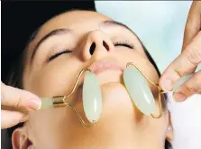  ?? GETTY IMAGES/ISTOCKPHOT­O ?? While facial massage can help with lymphatic drainage, jade itself has no special healing properties.