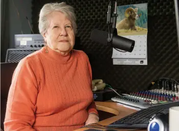  ?? Citizen photo by James Doyle ?? Judy Feyer sits behind the mic at the 93.1 CFIS studios.