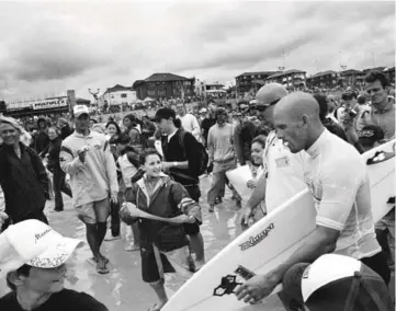  ??  ?? LIVING LEGEND No surfer has come close to Slater’s achievemen­ts in the sport