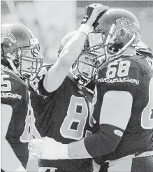  ?? BARRY GRAY THE HAMILTON SPECTATOR ?? Former Ticat offensive tackle and five-time CFL east all-star Dave Hack (68) was this year’s honouree at the Cats Claws Walk of Fame dinner.