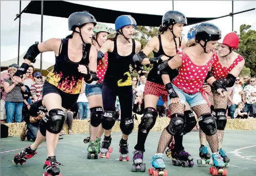  ?? PICTURES: SUPPLIED ?? GO GET ‘EM: The Cape Town Roller Girls show what roller derby is all about.