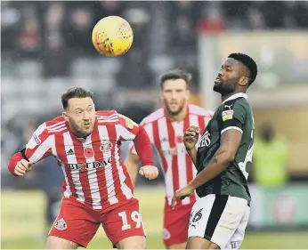  ??  ?? Aiden McGeady wins a header for Sunderland.