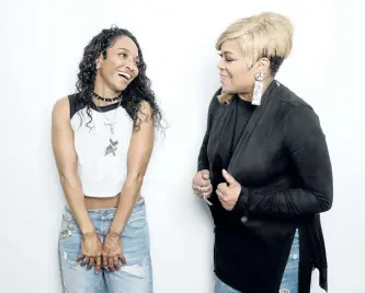  ?? TAYLOR JEWELL/THE ASSOCIATED PRESS ?? Rozonda Thomas, left, and Tionne Watkins of TLC pose for a portrait in New York to promote their self-titled album.