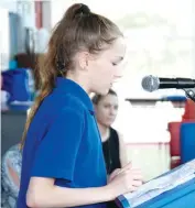  ??  ?? Megan Jones delivers her speech to her schoolmate­s.