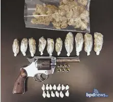  ?? BPDNEWS PHOTO ?? RECOVERED: Drugs and a gun seized by Boston police.