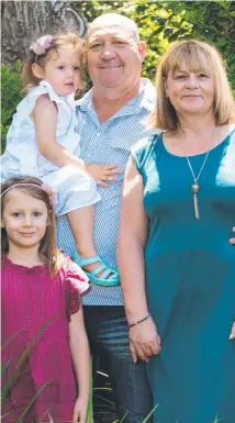  ?? Picture: Contribute­d ?? FORTUNATE: Lucky to be alive is (centre) Peter Jenkins, with wife Sue, and granddaugh­ters Zyana Jenkins-Watts and Tiana White.