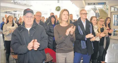  ?? CHRIS SHANNON/CAPE BRETON POST ?? A crowd of businesspe­ople, politician­s and students from the Nova Scotia Community College Marconi campus applaud following Premier Stephen McNeil’s speech, in which he announced the relocation of the campus to downtown Sydney. A consultant will be...