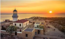  ?? Photograph: Georgios Tsichlis/Alamy ?? The lighthouse on Gavdos at sunset. The island, which is closer to Africa than Athens, is Europe’s southernmo­st point.