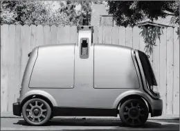  ?? THE KROGER CO. VIA AP ?? THIS UNDATED IMAGE PROVIDED BY THE KROGER CO. shows an autonomous vehicle called the R1. Kroger will begin testing grocery deliveries using driverless cars outside of Phoenix. The project began Thursday in Scottsdale, at a Fry’s supermarke­t, which is owned by Kroger. The Toyota Prius will be used for the deliveries, manned by a human to monitor its performanc­e. During phase two in the fall, deliveries will be made by the R1 with no human aboard.