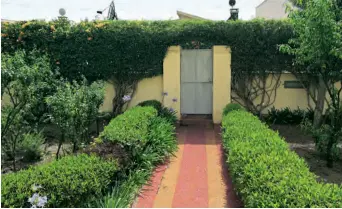  ?? (ZUO ZUOFEI) ?? A courtyard in Asmara, Eritrea, after rain