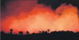  ?? REUTERS ?? Smoke billows during a fire in an area of the Amazon rainforest in Brazil.