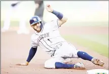  ??  ?? Carlos Correa #1 of the Houston Astros slides in to third base in the first inning against the Oakland Athletics at Oakland Alameda Coliseum on June
13, in Oakland, California. (AFP)