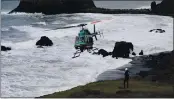  ?? KENT PORTER — THE PRESS DEMOCRAT ?? A Sonoma County sheriff’s helicopter team searches Monday for two missing children who were swept away in the surf at Blind Beach near Jenner.