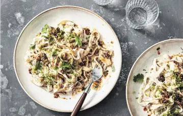  ?? CHRISTOPHE­R TESTANI/SIMON ANDREWS NYT ?? Creamy vegan tofu noodles is a dish that will win over any crowd, regardless of dietary dispositio­ns.