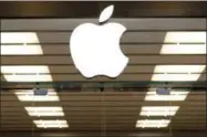  ?? THE ASSOCIATED PRESS ?? The Apple logo above a store location entrance, in Dallas, is shown. Apple will begin testing self-driving car technology in California, its first public move into a highly competitiv­e field that could radically change transporta­tion. The California...