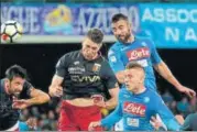  ?? AFP PHOTO ?? Raul Albiol (top right) scored Napoli’s winner against Genoa during their Serie A match on Sunday.