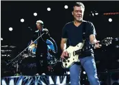  ?? PHOTO BY GREG ALLEN — INVISION — AP, FILE ?? David Lee Roth, left, and Eddie Van Halen of Van Halen perform on Aug. 13, 2015, in Wantagh, N.Y.