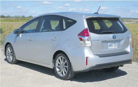  ?? — JIL MCINTOSH/DRIVING.CA ?? Longer than the Prius, the V has more rear-seat leg room and lots of cargo space.