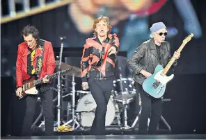  ?? ?? Mick Jagger (centre), Keith Richards (right) and Ronnie Wood on stage during the Rolling Stones ‘Sixty’ Tour at Anfield, Liverpool last night. It is titled Sixty to celebrate 60 years together