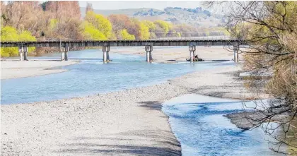  ?? Photo / File ?? Hawke’s Bay Regional Council warns dog owners to be diligent when walking pets near stony rivers due to toxic algae.