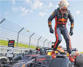  ?? FOTO: BRYN LENNON/AFP ?? Max Verstappen zeigte in Silverston­e eine beeindruck­ende Leistung.