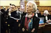  ?? JASPER JUINEN/BLOOMBERG NEWS ?? Christine Lagarde, shown Dec. 12 at her trial in Paris, will remain the leader of the Internatio­nal Monetary Fund.