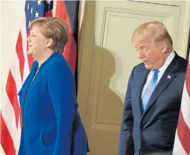  ?? AFP ?? Frialdad. Angela Merkel y Donald Trump marcaron sus diferencia­s.