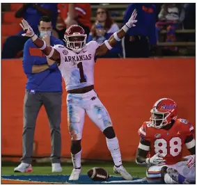  ?? (University of Arkansas photo/Walt Beazley) ?? Jalen Catalon (1) has seen his reputation as a hard-hitting safety grow in 2020. One of his hits Saturday against Florida’s Trent Whittemore sent the freshman out of the game with what was later reported as a broken rib and punctured lung.