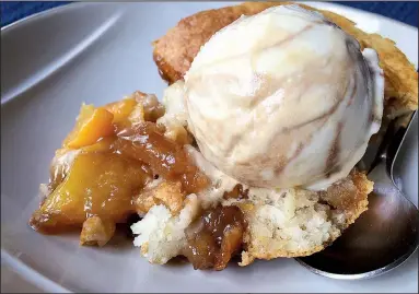  ?? Arkansas Democrat-Gazette/KELLY BRANT ?? Peach Cobbler Cake