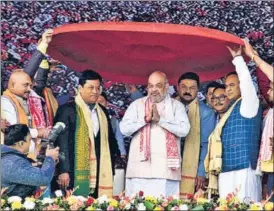  ??  ?? Union home minister Amit Shah (centre) with Assam CM Sarbananda Sonowal (2nd left), state minister Himanta Biswa Sarma and others at a rally at Kendukuchi in Nalbari district on Sunday.ani