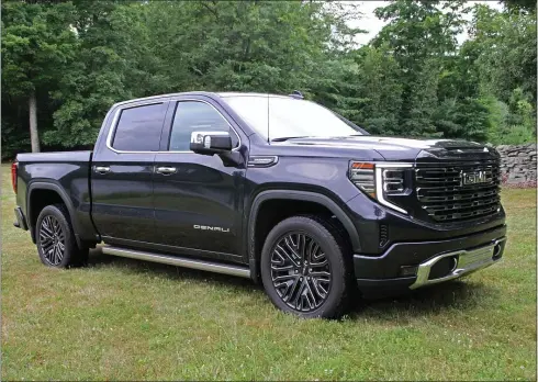  ?? MARC GRASSO PHOTOS / BOSTON HERALD ?? NICE BUT PRICY: The GMC Sierra Denali 1500 pickup truck is dream vehicle that hits all the makrs for truck utility and comfort and style, but it will cost you.