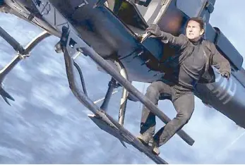  ??  ?? Heli exciting: Cruise takes a helicopter ride in Mission: Impossible – Fallout.