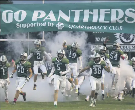  ?? JENNIFER FORBUS — FOR THE MORNING JOURNAL ?? Elyria Catholic takes the field for its game against Valley Forge on Oct. 4, 2019.