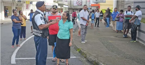  ?? Photo: Ronald Kumar ?? Ellery Street in Suva was closed to motorist as people line up outside Fiji National Provident Fund to submit relief applicatio­ns on April 20, 2020.