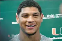  ?? JOE CAVARETTA/SOUTH FLORIDA SUN SENTINEL ?? Hurricanes tight end Elijah Arroyo, shown talking to the media on March 4, is healthy after dealing with a knee injury for most of the last two seasons.