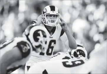  ?? K.C. Alfred San Diego Union-Tribune ?? SECOND-YEAR quarterbac­k Jared Goff played two series and drove the Rams to their only touchdown. Rams 13, Cowboys 10