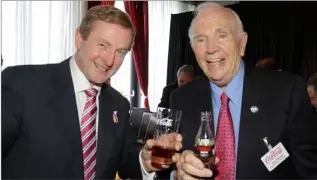  ??  ?? Then Taoiseach Enda Kenny, pictured with former Coca-Cola director Donald Keough, at Whites Hotel, Wexford when Coca-Cola opened its Wexford plant in 2011.