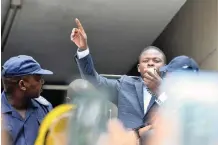  ?? African News Agency (ANA) OUPA MOKOENA ?? FOUNDER of Enlightene­d Christian Gathering Church Bushiri addresses his followers outside the Specialise­d Commercial Crimes Court after he was granted bail. |