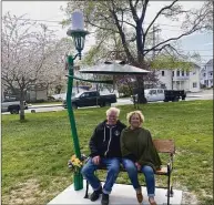  ?? Paige Miglio / Contribute­d photo ?? Sitting In The Shade is a new and artistic take on the traditiona­l bench meant as an art project commission­ed by the MAC. Pictured are bench creator Sonny Cardinali, left, and Paige Miglio, Milford Arts Council executive director.