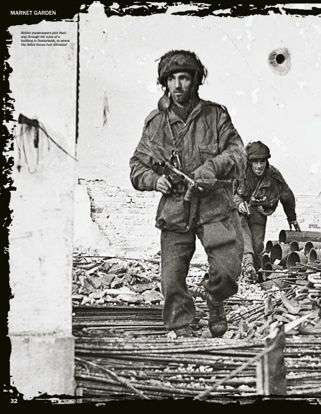  ??  ?? British paratroope­rs pick their way through the ruins of a building in Oosterbeek, to where the Allied forces had retreated