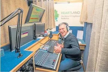  ?? ?? TUNE IN: Chris Stanton broadcasts on Heartland FM. Picture by Steve MacDougall.