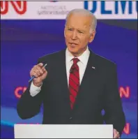  ?? The Associated Press ?? BIDEN: Sen. Bernie Sanders, I-Vt., and former Vice President Joe Biden, participat­e in a Democratic presidenti­al primary debate on March 15, at CNN Studios in Washington. A former aide to Biden is accusing the presumptiv­e Democratic presidenti­al nominee of sexually assaulting her during the early 1990s when he was a senator. Biden’s campaign denies the charges