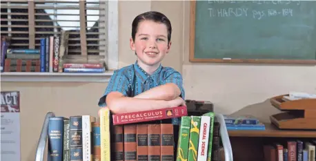  ?? PHOTOS BY ROBERT HANASHIRO, USA TODAY ?? Iain Armitage plays Young Sheldon. The 9-year-old rocked the profession­al-actor photo shoot on the comedy’s classroom set.