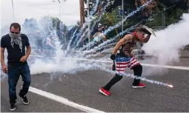  ??  ?? Far-right extremists and anti-fascist counter protesters clashed on Sunday in Portland, Oregon. Photograph: Nathan Howard/Getty Images