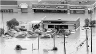  ?? DAVID J. PHILLIP/AP ?? Floodwater­s in Houston last week.