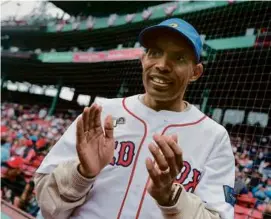  ?? MICHAEL DWYER/ASSOCIATED PRESS ?? Meb Keflezighi, the 2014 Boston Marathon men’s champion, threw out a ceremonial first pitch Sunday at Fenway Park.