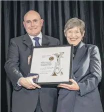  ?? PHOTO: SUPPLIED ?? University of Otago School of Biomedical Sciences Distinguis­hed Professor Neil Gemmell is presented with the 2020 Hutton Medal by Christchur­ch Mayor Lianne Dalziel at a ceremony in Christchur­ch last night.