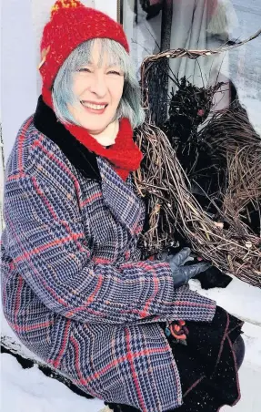  ??  ?? Talented June McEwan of Crieff Arts Festival with her willow cat window display for The Great Big Art Exhibition