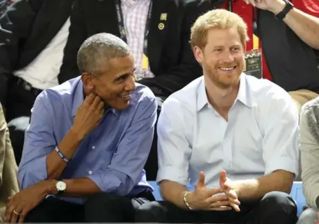  ?? CHRIS JACKSON/GETTY IMAGES FOR THE INVICTUS GAMES FOUNDATION ?? Former U.S. president Barack Obama and Prince Harry at the Invictus Games. In a speech Friday, Obama acknowledg­ed his optimism is hard earned.