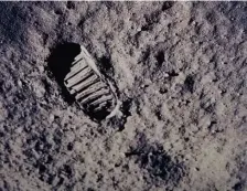  ?? AP FILE PHOTOS ?? EXPLORING SPACE: A footprint left by the astronauts of the Apollo 11 mission lies on the surface of the moon on July 20, 1969. The crew, at left from left, were Neil Armstrong, commander; Michael Collins, module pilot; Edwin E. ‘Buzz’ Aldrin, lunar module pilot.